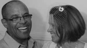 Jim and Lori King laughing at wedding May 2012