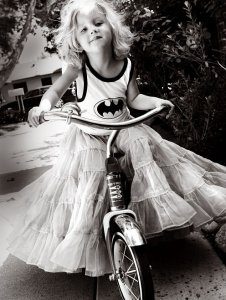 Bat girl on a bike