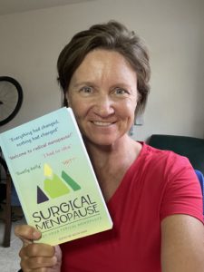 Lori Ann King, Author holding book: Surgical Menopause ~ Not Your Typical Menopause