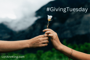 two hands passing a flower as a gift to represent #givingtuesday that doesn't cost money