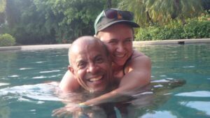Jim and Lori Ann King hugging in the waters of Costa Rica